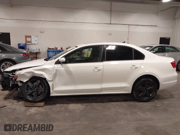 ✅ 2012 Volkswagen Jetta TDI • VIN: 3VWLL7AJ0CM327565 • Lot: 43458799. Wystawiony na IAAI z przebiegiem 142 422 mil. Bezpłatny archiwum sprzedaży aukcyjnych z USA i szczegółowy raport historii pojazdu na DreamBid. Zdjęcie 15.