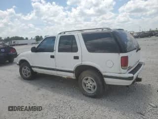 ✅ 1997 Chevrolet Blazer LS • VIN: 1GNDT13W7V2250580 • Lot: 62598535. Wystawiony na Copart z przebiegiem 169 860 mil. Bezpłatny archiwum sprzedaży aukcyjnych z USA i szczegółowy raport historii pojazdu na DreamBid. Zdjęcie 2.