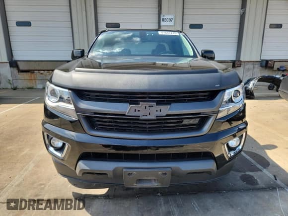 ✅ 2015 Chevrolet Colorado 2WD Z71 • VIN: 1GCHSCE31F1175037 • Лот: 61641745. Опубликован ранее на Copart с пробегом 93 310 миль. Бесплатный доступ к архиву аукционных продаж из США и подробный отчёт об истории автомобиля на DreamBid. Изображение 5.