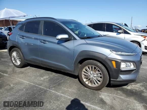 2018 Hyundai Kona SEL with VIN KM8K22AA2JU075116, listed as a Copart auction lot 84266075 with 47,631 mi miles and Salvage title. Bid and sale history available at DreamBid. Image 4.