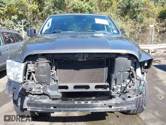 2013 Ram 1500 Express z VIN 3C6JR6ATXDG505915, wystawiony jako IAAI lot #43504506 z przebiegiem 171 665 mil mil oraz . Historia ofert i sprzedaży dostępna na DreamBid. Obrazek 13.