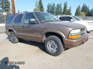 2004 Chevrolet Blazer LS with VIN 1GNDT13XX4K131557, listed as a IAAI auction lot 42085978 with 199,479 mi miles and . Bid and sale history available at DreamBid. Image 1.