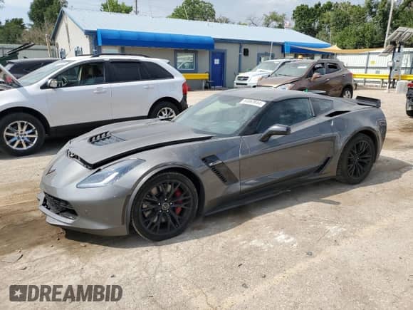 2015 Chevrolet Corvette Z06 2LZ with VIN 1G1YS2D66F5605815, listed as a Copart auction lot 64863644 with 77,778 mi miles and Salvage title. Bid and sale history available at DreamBid. Image 1.
