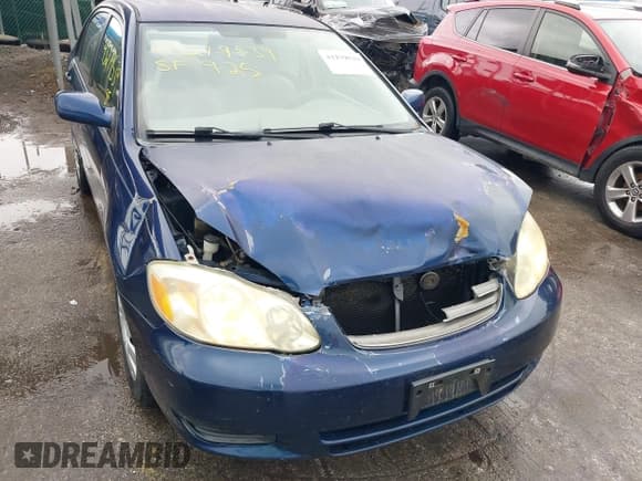 ✅ 2003 Toyota Corolla LE • VIN: JTDBR32EX30037456 • Lot: 43279539. Listed on IAAI with 157,118 mi. Free auction sales archive from the USA and detailed vehicle history report at DreamBid. Image 6.