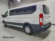 ✅ 2023 Ford Transit Passenger XLT • VIN: 1FBAX2YGXPKA58486 • Lot: 94293235. Listed on Copart with 51,472 mi. Free auction sales archive from the USA and detailed vehicle history report at DreamBid. Image 2.