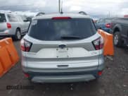 ✅ 2018 Ford Escape SE • VIN: 1FMCU9GDXJUB61928 • Лот: 43806248. Опубликован ранее на IAAI с пробегом 196 919 миль. Бесплатный доступ к архиву аукционных продаж из США и подробный отчёт об истории автомобиля на DreamBid. Изображение 16.