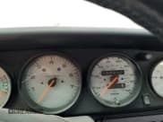 ✅ 1995 Porsche 911 • VIN: WP0CA2992SS341611 • Lot: 71677545. Wystawiony na Copart z przebiegiem 50 210 mil. Bezpłatny archiwum sprzedaży aukcyjnych z USA i szczegółowy raport historii pojazdu na DreamBid. Zdjęcie 9.