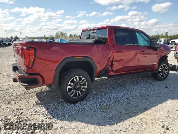 ✅ 2023 GMC Sierra 2500HD AT4 • VIN: 1GT49PE71PF190632 • Лот: 70878005. Опубликован ранее на Copart с пробегом 99 376 миль. Бесплатный доступ к архиву аукционных продаж из США и подробный отчёт об истории автомобиля на DreamBid. Изображение 3.