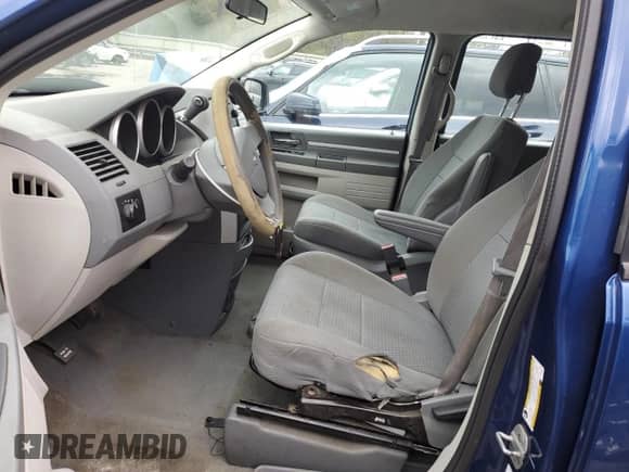 2010 Dodge Grand Caravan SE with VIN 2D4RN4DEXAR336545, listed as a Copart auction lot 89703345 with 184,045 mi miles and Salvage title. Bid and sale history available at DreamBid. Image 7.