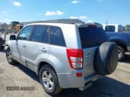 ✅ 2006 Suzuki Grand Vitara Premium • VIN: JS3TE943464100645 • Lot: 41876575. Wystawiony na IAAI z przebiegiem 240 323 mil. Bezpłatny archiwum sprzedaży aukcyjnych z USA i szczegółowy raport historii pojazdu na DreamBid. Zdjęcie 3.