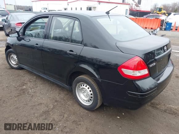 ✅ 2009 Nissan Versa 1.6 • VIN: 3N1CC11EX9L458233 • Lot: 43754363. Listed on IAAI with 148,298 mi. Free auction sales archive from the USA and detailed vehicle history report at DreamBid. Image 3.