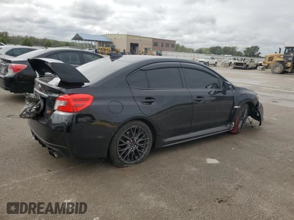 ✅ 2017 Subaru WRX STI • VIN: JF1VA2M64H9830412 • Lot: 84922945. Listed on Copart with 82,938 mi. Free auction sales archive from the USA and detailed vehicle history report at DreamBid. Image 3.