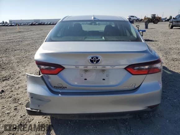 2021 Toyota Camry Hybrid LE with VIN 4T1C31AK1MU021816, listed as a Copart auction lot 82125225 with 69,205 mi miles and Salvage title. Bid and sale history available at DreamBid. Image 6.
