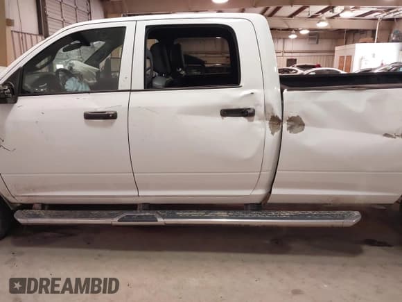 ✅ 2023 Ram 2500 Tradesman • VIN: 3C6UR5HL0PG529660 • Lot: 41491722. Listed on IAAI with 43,672 mi. Free auction sales archive from the USA and detailed vehicle history report at DreamBid. Image 14.