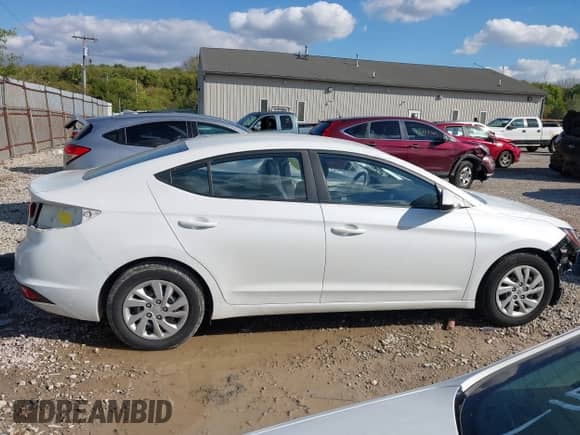 2019 Hyundai Elantra SE z VIN 5NPD74LF3KH415341, wystawiony jako IAAI lot #43413818 z przebiegiem 106 025 mil mil oraz . Historia ofert i sprzedaży dostępna na DreamBid. Obrazek 14.