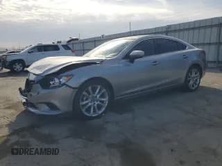✅ 2014 Mazda 6 i Touring • VIN: JM1GJ1V60E1160976 • Lot: 81461525. Listed on Copart with 147,494 mi. Free auction sales archive from the USA and detailed vehicle history report at DreamBid. Image 1.