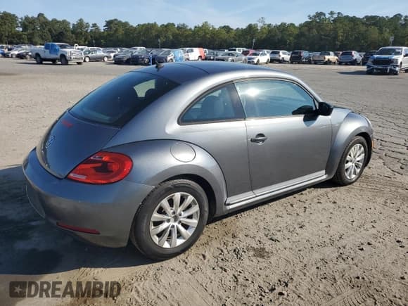 ✅ 2014 Volkswagen Beetle Entry • VIN: 3VWFP7AT7EM623088 • Lot: 83792065. Listed on Copart with 142,189 mi. Free auction sales archive from the USA and detailed vehicle history report at DreamBid. Image 3.