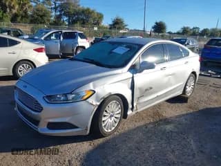 ✅ 2015 Ford Fusion SE Hybrid • VIN: 3FA6P0LU2FR105125 • Лот: 43677486. Опубликован ранее на IAAI с пробегом 171 280 миль. Бесплатный доступ к архиву аукционных продаж из США и подробный отчёт об истории автомобиля на DreamBid. Изображение 2.