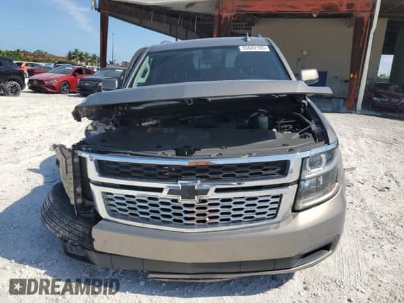 2018 Chevrolet Suburban LS с VIN 1GNSCGKC6JR249746, выставлен на аукционе Copart как лот 55622105 с пробегом 126 378 миль миль и Списание • Salvage title. История ставок и продаж доступна на DreamBid. Изображение 5.