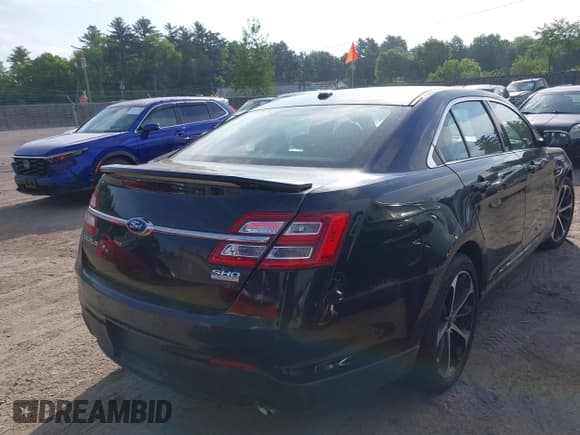 ✅ 2014 Ford Taurus SHO • VIN: 1FAHP2KT5EG136579 • Lot: 42384706. Listed on IAAI with 82,514 mi. Free auction sales archive from the USA and detailed vehicle history report at DreamBid. Image 16.