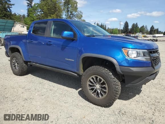 ✅ 2020 Chevrolet Colorado 4WD ZR2 • VIN: 1GCPTEE19L1176032 • Lot: 56003155. Listed on Copart with 44,548 mi. Free auction sales archive from the USA and detailed vehicle history report at DreamBid. Image 4.