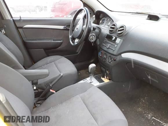 2011 Chevrolet Aveo 1LT z VIN KL1TD5DE2BB124564, wystawiony jako IAAI lot #41388512 z przebiegiem 109 833 mil mil oraz . Historia ofert i sprzedaży dostępna na DreamBid. Obrazek 5.