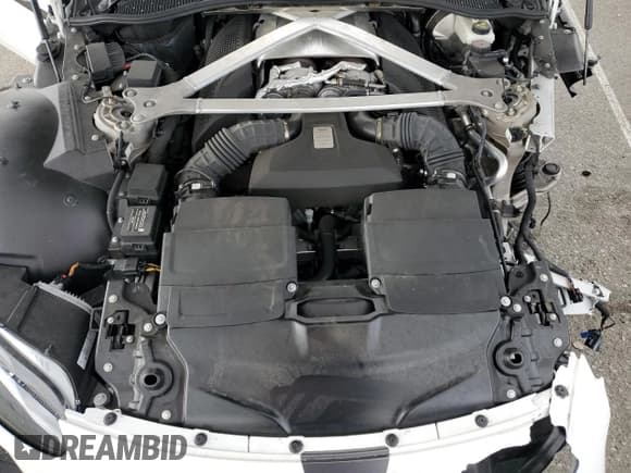 ✅ 2022 Aston Martin Vantage • VIN: SCFSMGAW9NGN50113 • Лот: 54609915. Опубликован ранее на Copart с пробегом Не указан. Бесплатный доступ к архиву аукционных продаж из США и подробный отчёт об истории автомобиля на DreamBid. Изображение 11.