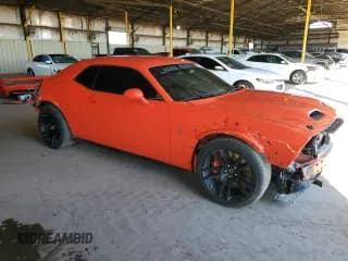 ✅ 2022 Dodge Challenger SRT Hellcat Redeye Widebody • VIN: 2C3CDZL99NH242003 • Lot: 38351624. Wystawiony na Copart z przebiegiem 6 876 mil. Bezpłatny archiwum sprzedaży aukcyjnych z USA i szczegółowy raport historii pojazdu na DreamBid. Zdjęcie 4.