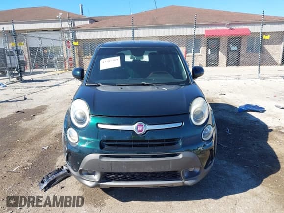 ✅ 2014 FIAT 500L Trekking • VIN: ZFBCFADH5EZ006206 • Lot: 43387369. Listed on IAAI with 81,124 mi. Free auction sales archive from the USA and detailed vehicle history report at DreamBid. Image 12.