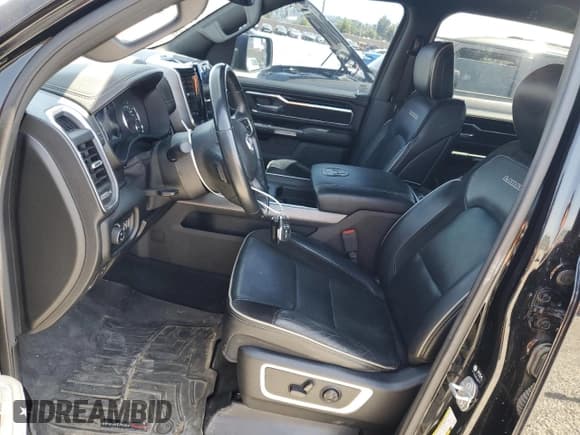 ✅ 2021 Ram 1500 Laramie • VIN: 1C6SRFJM5MN598833 • Lot: 61274845. Wystawiony na Copart z przebiegiem 105 722 mil. Bezpłatny archiwum sprzedaży aukcyjnych z USA i szczegółowy raport historii pojazdu na DreamBid. Zdjęcie 7.