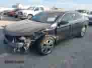 2014 Chevrolet Impala LT z VIN 2G1125S3XE9264321, wystawiony jako IAAI lot #43326452 z przebiegiem 224 450 mil mil oraz . Historia ofert i sprzedaży dostępna na DreamBid. Obrazek 2.