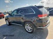 ✅ 2014 Jeep Grand Cherokee • VIN: 1C4RJEJMXEC585632 • Lot: 62036515. Listed on Copart with 148,660 mi. Free auction sales archive from the USA and detailed vehicle history report at DreamBid. Image 2.