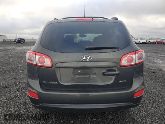 ✅ 2012 Hyundai Santa Fe GLS • VIN: 5XYZGDAB0CG105078 • Лот: 90475405. Размещён на Copart с пробегом 101 439 миль миль. Получите бесплатный доступ к архиву аукционных продаж из США и посмотрите подробный отчёт об истории автомобиля на DreamBid. Изображение 6.