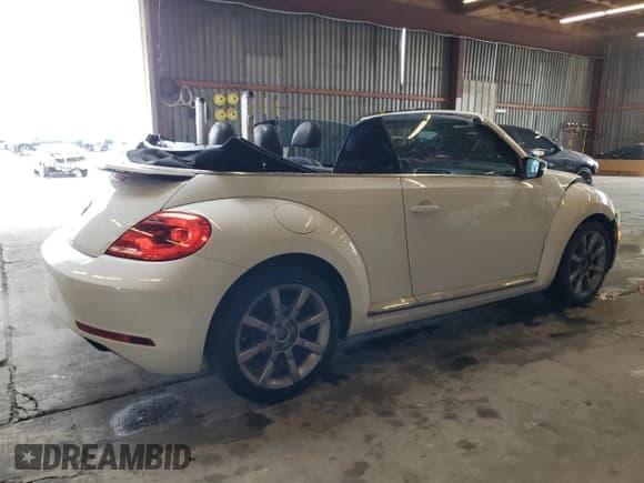 ✅ 2014 Volkswagen Beetle 2.0L TDI • VIN: 3VW5L7AT8EM817815 • Lot: 48077945. Listed on Copart with 63,015 mi. Free auction sales archive from the USA and detailed vehicle history report at DreamBid. Image 3.