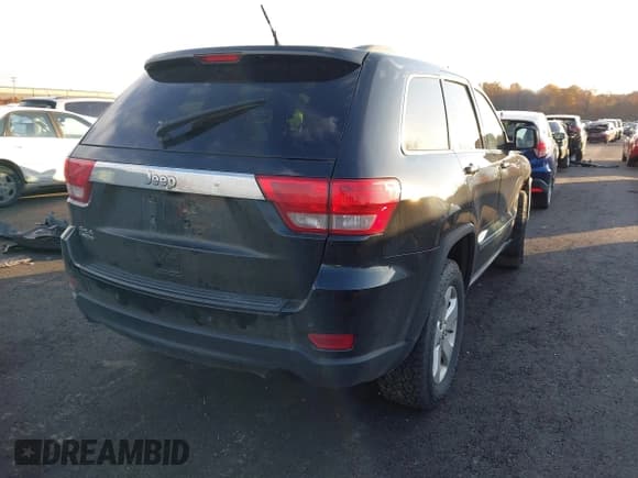 ✅ 2012 Jeep Grand Cherokee Laredo • VIN: 1C4RJFAG3CC221565 • Lot: 43618945. Listed on IAAI with 160,737 mi. Free auction sales archive from the USA and detailed vehicle history report at DreamBid. Image 4.