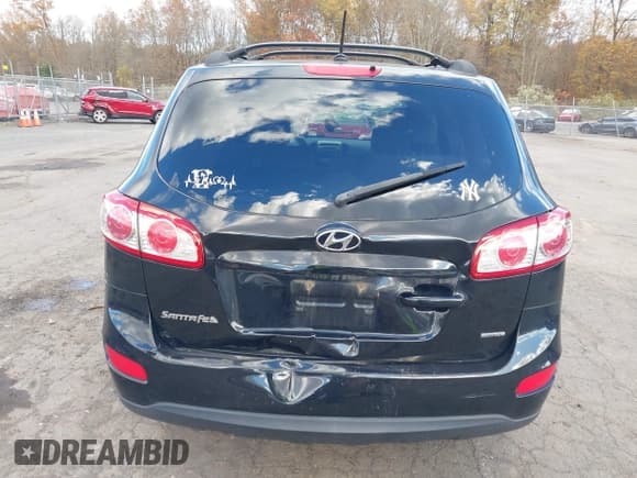 ✅ 2012 Hyundai Santa Fe GLS • VIN: 5XYZGDAB1CG100634 • Lot: 43607374. Listed on IAAI with 178,389 mi. Free auction sales archive from the USA and detailed vehicle history report at DreamBid. Image 12.