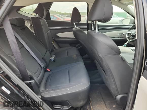 2023 Hyundai Tucson Blue z VIN KM8JBCA18PU084879, wystawiony jako Copart lot #71151435 z przebiegiem 13 377 mil mil oraz Szkoda całkowita • Salvage title. Historia ofert i sprzedaży dostępna na DreamBid. Obrazek 10.