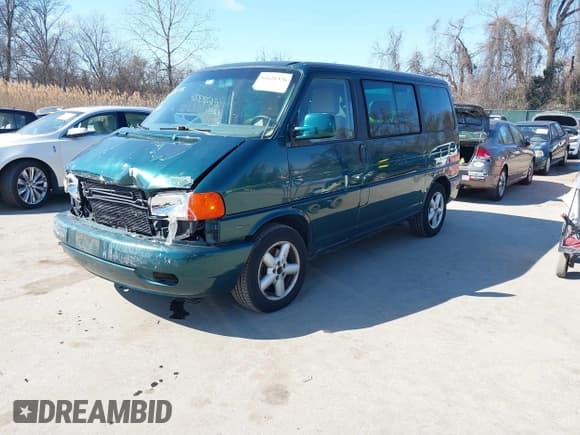 ✅ 2002 Volkswagen EuroVan GLS • VIN: WV2KB47002H029567 • Lot: 41628376. Listed on IAAI with 156,866 mi. Free auction sales archive from the USA and detailed vehicle history report at DreamBid. Image 2.