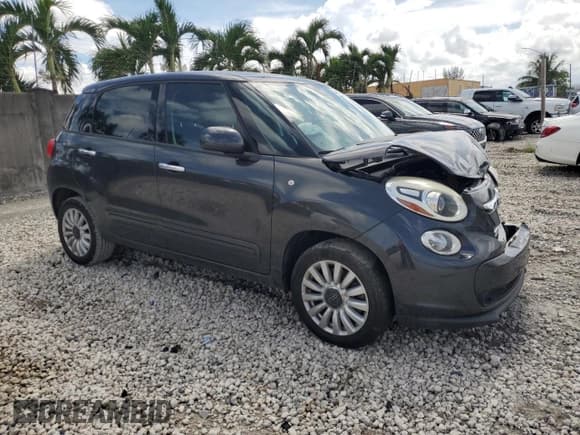 ✅ 2015 FIAT 500L Easy • VIN: ZFBCFABH3FZ030606 • Lot: 65600614. Listed on Copart with 63,961 mi. Free auction sales archive from the USA and detailed vehicle history report at DreamBid. Image 4.