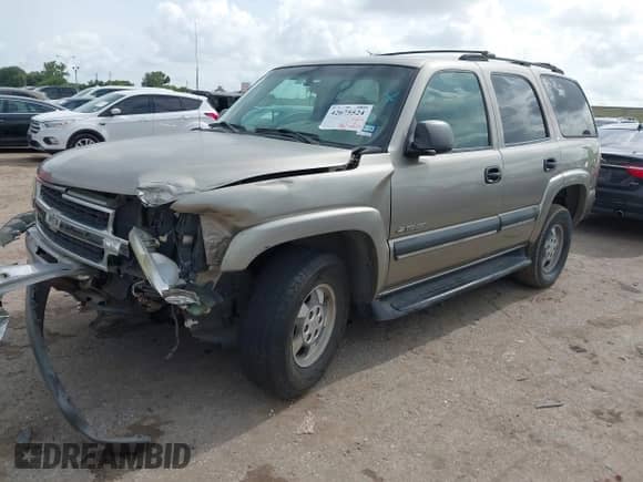 2002 Chevrolet Tahoe LS with VIN 1GNEC13Z42R246617, listed as a IAAI auction lot 42675524 with 306,596 mi miles and . Bid and sale history available at DreamBid. Image 16.