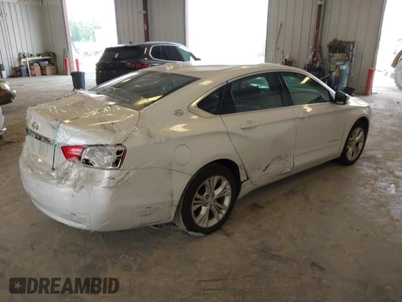 ✅ 2015 Chevrolet Impala LT • VIN: 1G1115SLXFU114815 • Lot: 42734350. Listed on IAAI with 192,818 mi. Free auction sales archive from the USA and detailed vehicle history report at DreamBid. Image 4.