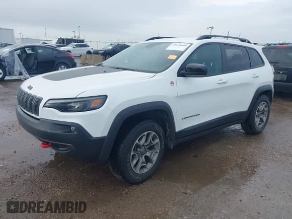✅ 2022 Jeep Cherokee Trailhawk • VIN: 1C4PJMBX6ND528851 • Lot: 42668905. Listed on IAAI with 48,819 mi. Free auction sales archive from the USA and detailed vehicle history report at DreamBid. Image 2.