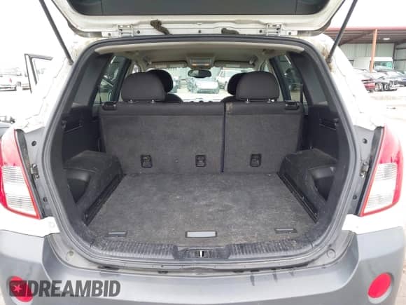 2015 Chevrolet Captiva Sport LS z VIN 3GNAL2EK2FS506410, wystawiony jako IAAI lot #42180711 z przebiegiem 154 228 mil mil oraz . Historia ofert i sprzedaży dostępna na DreamBid. Obrazek 17.