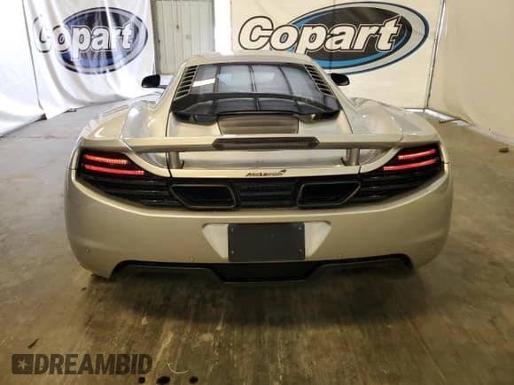 ✅ 2012 McLaren MP4-12C • VIN: SBM11AAA6CW001273 • Lot: 65693435. Listed on Copart with 31,302 mi. Free auction sales archive from the USA and detailed vehicle history report at DreamBid. Image 6.