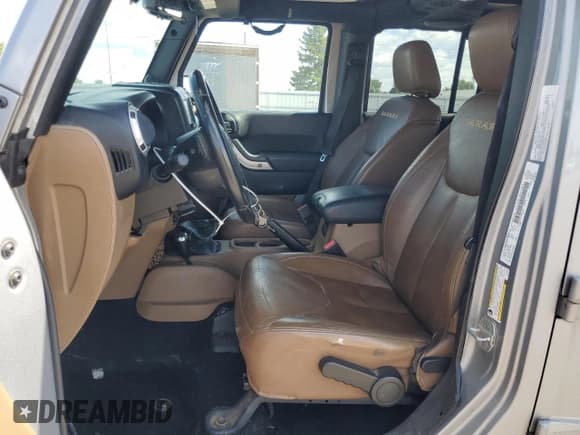 ✅ 2014 Jeep Wrangler Unlimited Sahara • VIN: 1C4BJWEG9EL108847 • Lot: 70563165. Wystawiony na Copart z przebiegiem 172 316 mil. Bezpłatny archiwum sprzedaży aukcyjnych z USA i szczegółowy raport historii pojazdu na DreamBid. Zdjęcie 7.