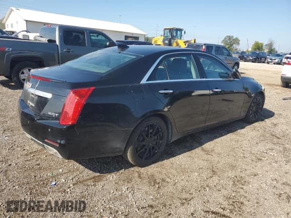 ✅ 2015 Cadillac CTS Luxury AWD • VIN: 1G6AX5SX3F0120734 • Лот: 81426705. Опубликован ранее на Copart с пробегом 159 496 миль. Бесплатный доступ к архиву аукционных продаж из США и подробный отчёт об истории автомобиля на DreamBid. Изображение 3.