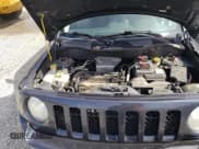 ✅ 2014 Jeep Patriot Sport • VIN: 1C4NJPBB0ED726466 • Lot: 42163543. Listed on Copart with 137,464 mi. Free auction sales archive from the USA and detailed vehicle history report at DreamBid. Image 13.