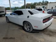 ✅ 2021 Dodge Challenger SXT • VIN: 2C3CDZAG8MH627066 • Lot: 82298095. Wystawiony na Copart z przebiegiem 96 288 mil. Bezpłatny archiwum sprzedaży aukcyjnych z USA i szczegółowy raport historii pojazdu na DreamBid. Zdjęcie 2.