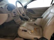 ✅ 2004 Ford Mustang Deluxe • VIN: 1FAFP44624F154570 • Lot: 60907825. Listed on Copart with 169,651 mi. Free auction sales archive from the USA and detailed vehicle history report at DreamBid. Image 7.