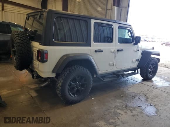 ✅ 2022 Jeep Wrangler Unlimited Sport S • VIN: 1C4HJXDG6NW186034 • Lot: 54601555. Listed on Copart with 67,486 mi. Free auction sales archive from the USA and detailed vehicle history report at DreamBid. Image 3.